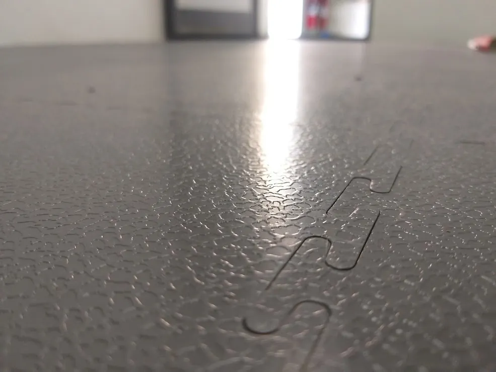 Interlocking PVC floor tiles in an industrial unit